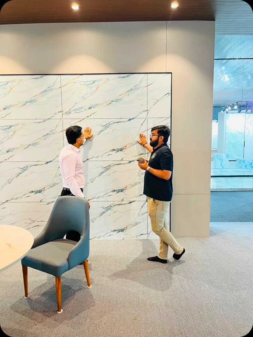 Large-format slabs being inspected under showroom lighting