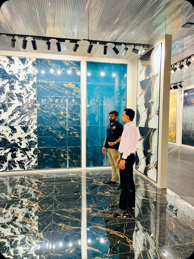 Visitors walking through the luxury stone collection gallery