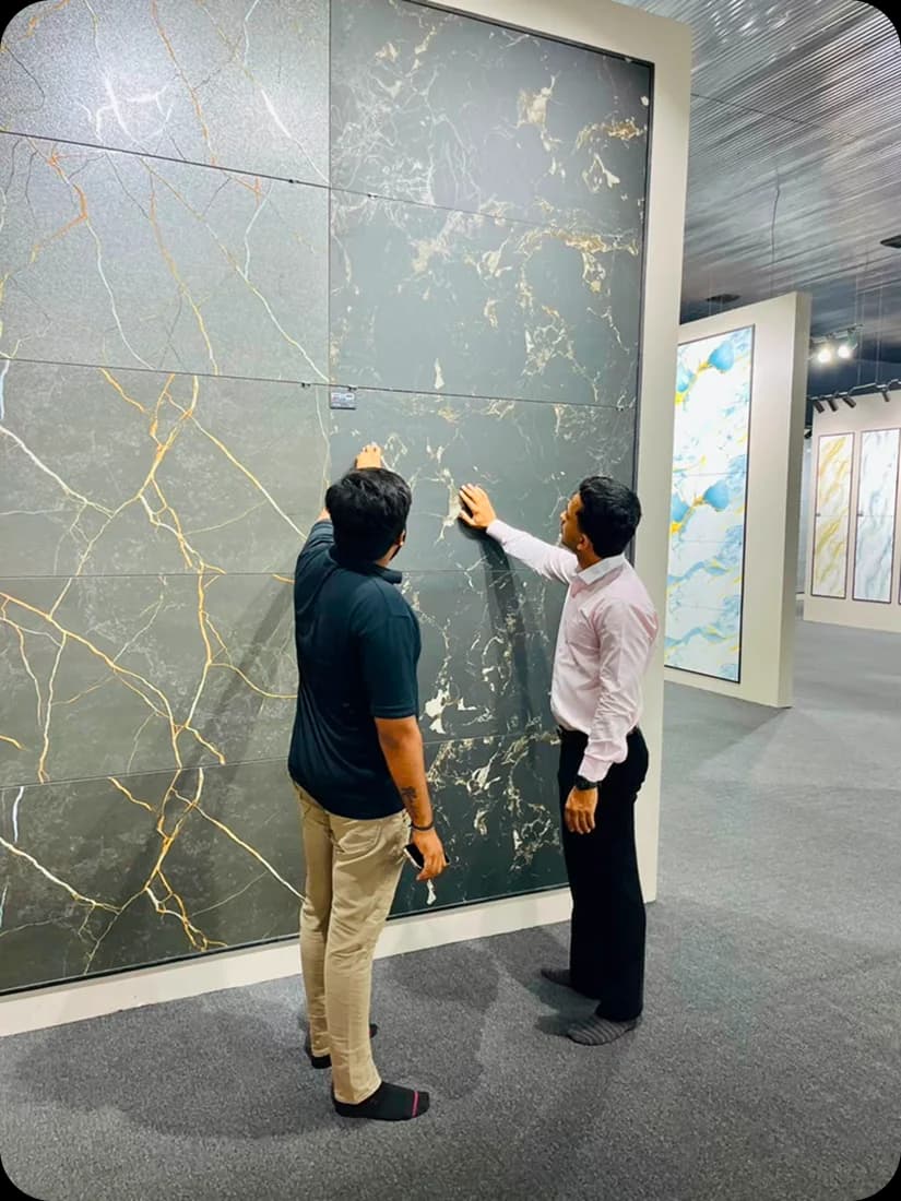 A design consultation in front of a large-format marble slab display